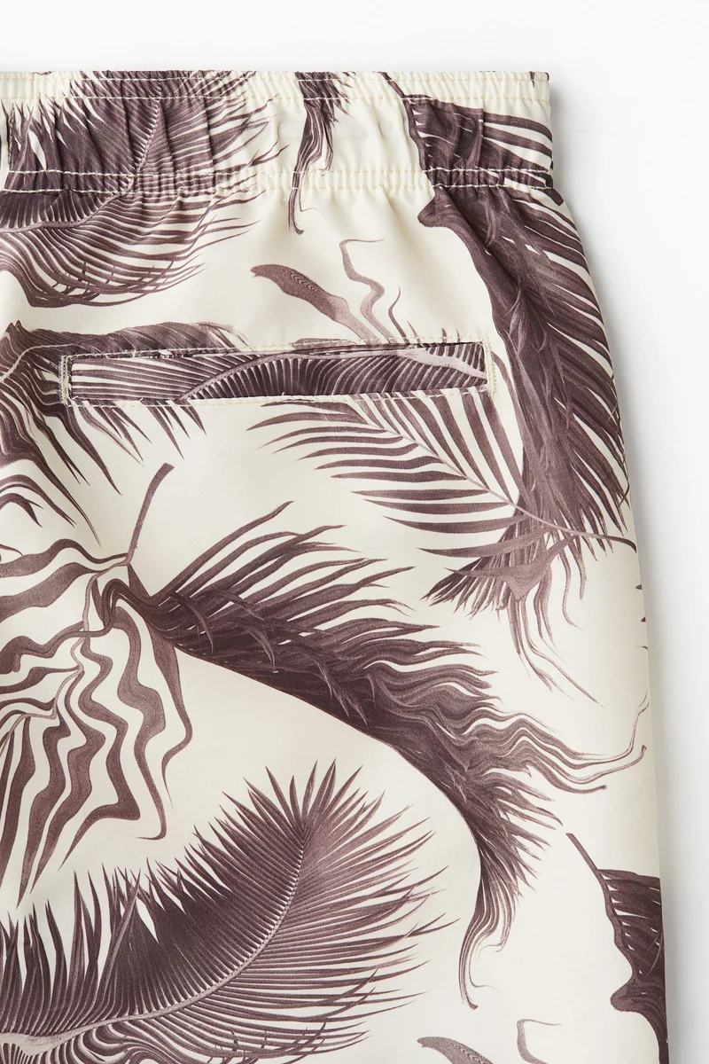 اتش اند ام شورت سباحة بنقوش