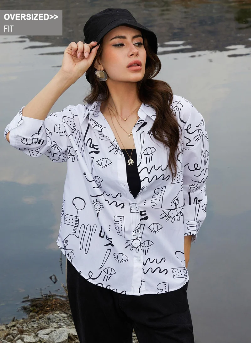 Campus Sutra Campus Sutra Women's Daisy White Doodle Oversized Shirt For Casual Wear | Spread Collar | Long Sleeve | Button Closure | Oversized Shirt Crafted With Comfort Fit For Everyday Wear