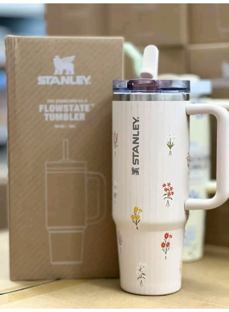 Stanley Quencher H2.0 FlowState Stainless Steel Vacuum Insulated Tumbler with Lid and Straw for Water, Iced Tea or Coffee, Smoothie and More, 40 oz - Image 1