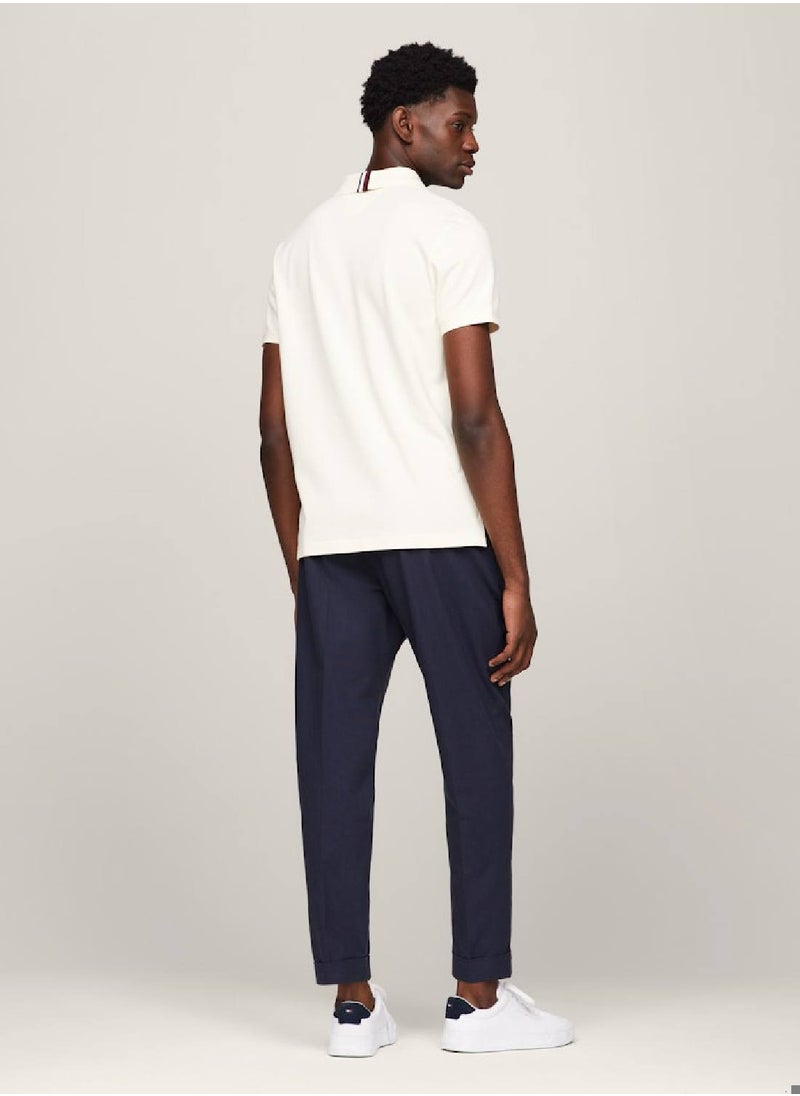 TOMMY HILFIGER - Men's Th Monogram Appliqué Regular Fit Polo -  Stretch organic cotton pique, Beige - Image 1