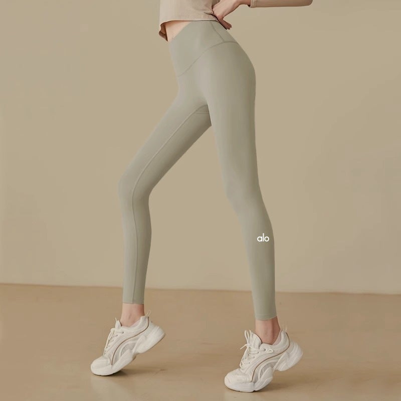 Alo Yoga High Waist Peach Butt Seamless Yoga Pants for Running and Fitness - Image 1