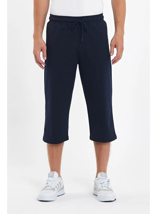 Men's Navy Blue Knee-Length Bermuda Capri Long Shorts with Zippered Pockets and Adjustable Elastic Waist.