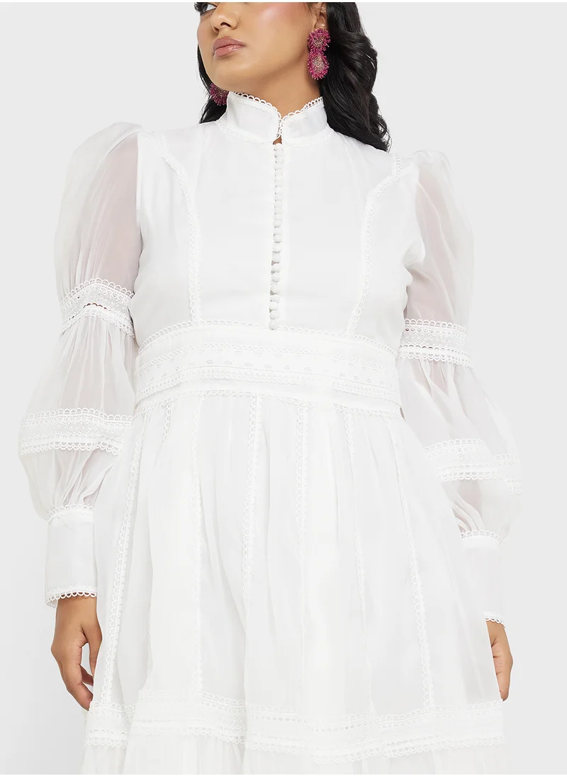 خزانة Plus size puff sleeve dress with lace trim