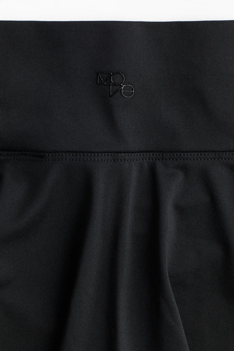 اتش اند ام تنورة تينس بقصة دائرية من نسيج دراي موف