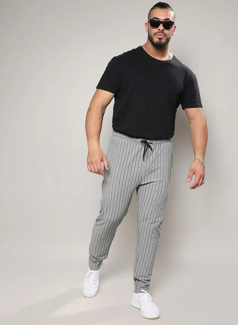 Instafab Plus  Instafab Plus Men's Moon Grey Pinstriped Trackpants For Casual Wear | Angled Open Pocket | Drawstring Closure | Trackpant Crafted With Comfort Fit For Everyday Wear for Men | Best Price UAE