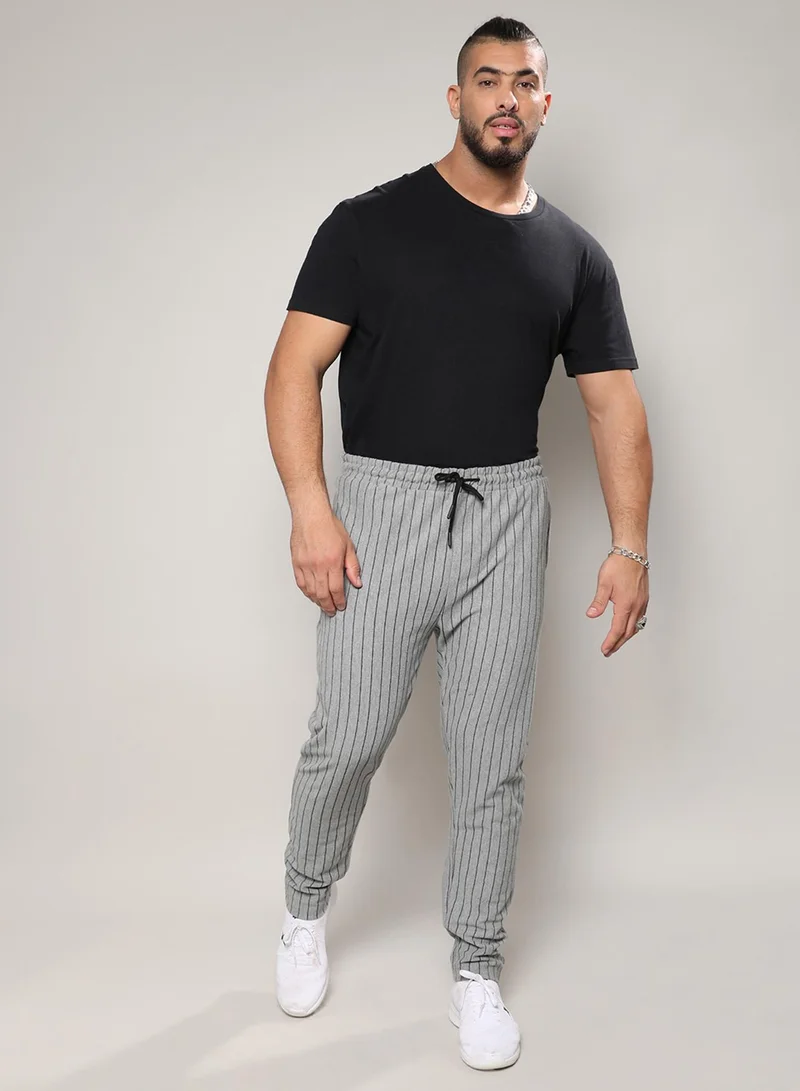 Instafab Plus  Instafab Plus Men's Moon Grey Pinstriped Trackpants For Casual Wear | Angled Open Pocket | Drawstring Closure | Trackpant Crafted With Comfort Fit For Everyday Wear for Men | Best Price UAE