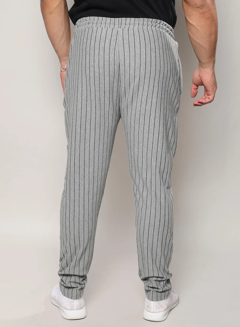 Instafab Plus  Instafab Plus Men's Moon Grey Pinstriped Trackpants For Casual Wear | Angled Open Pocket | Drawstring Closure | Trackpant Crafted With Comfort Fit For Everyday Wear for Men | Best Price UAE
