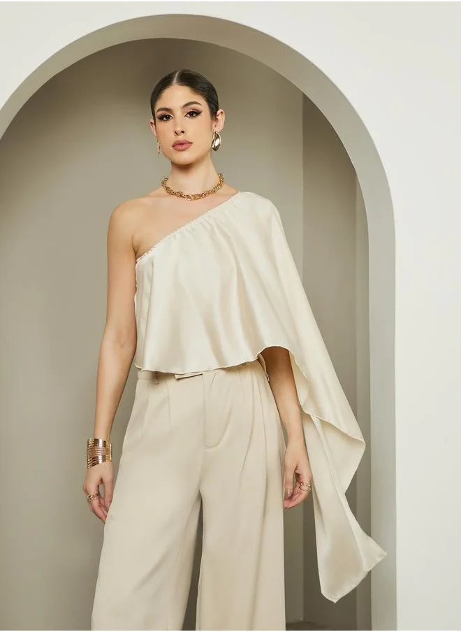 ستايلي One Shoulder Asymmetric Neck Cape Blouse