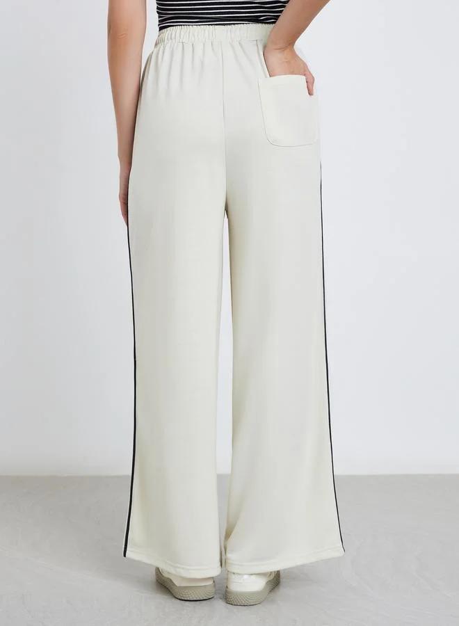 Styli Styli Women Off White Wide Leg Joggers with Contrast Piping Detail