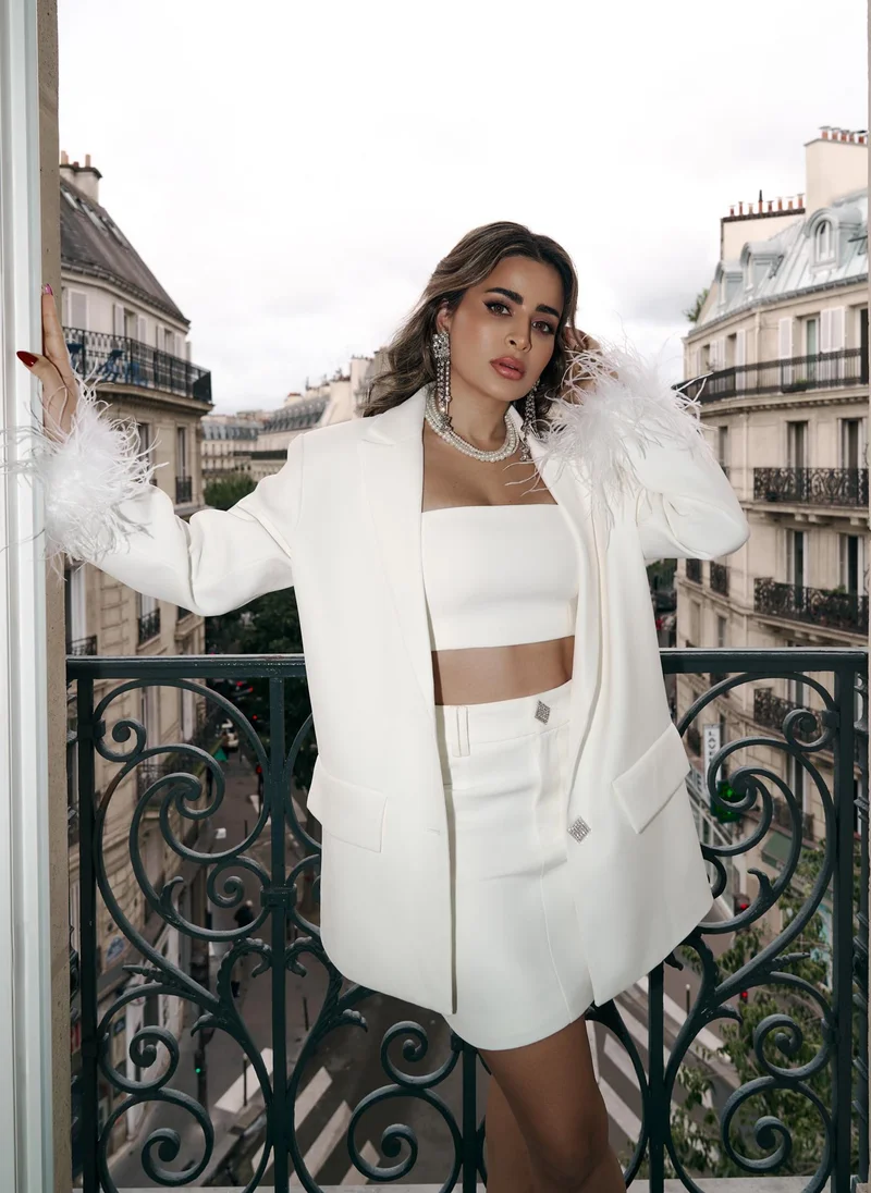 Lichi Single-breasted jacket with accent buttons and feathers