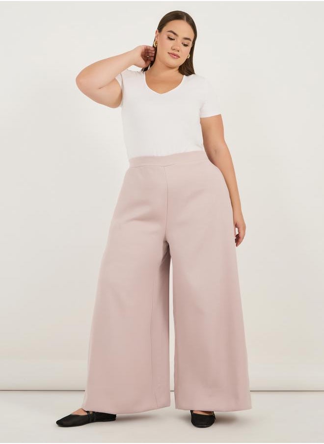 Styli Plus Size Solid High Rise Wide Leg Pants  - Image 1