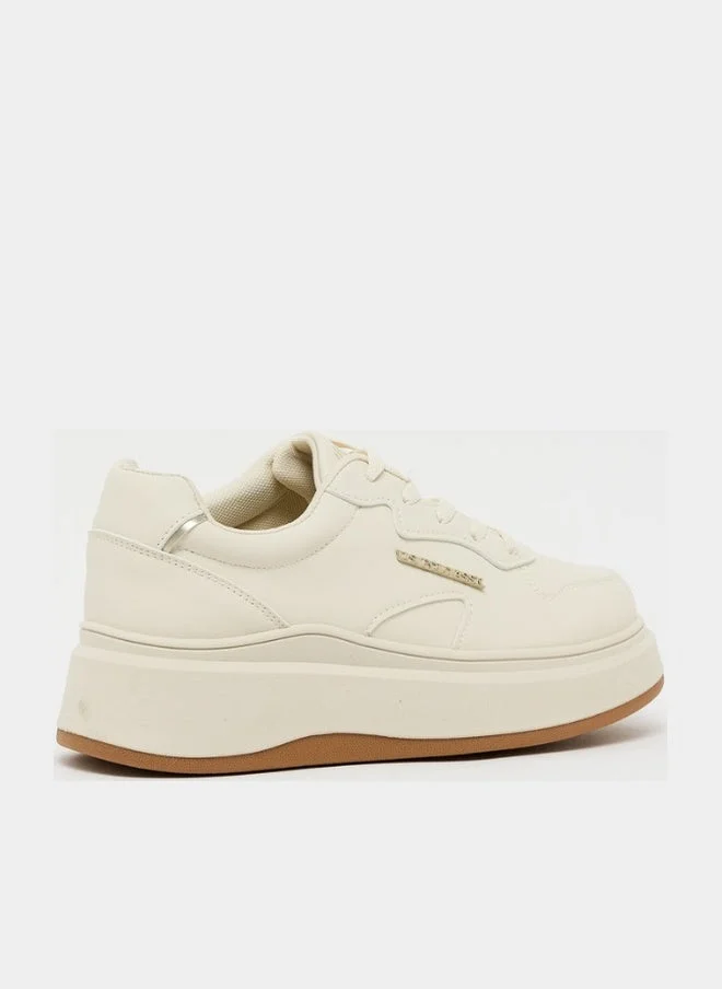 يو اس بولو اسن U.S. Polo Assn. Women’s CALISTA GLB 5PR Chunky Sole Sneakers - Beige