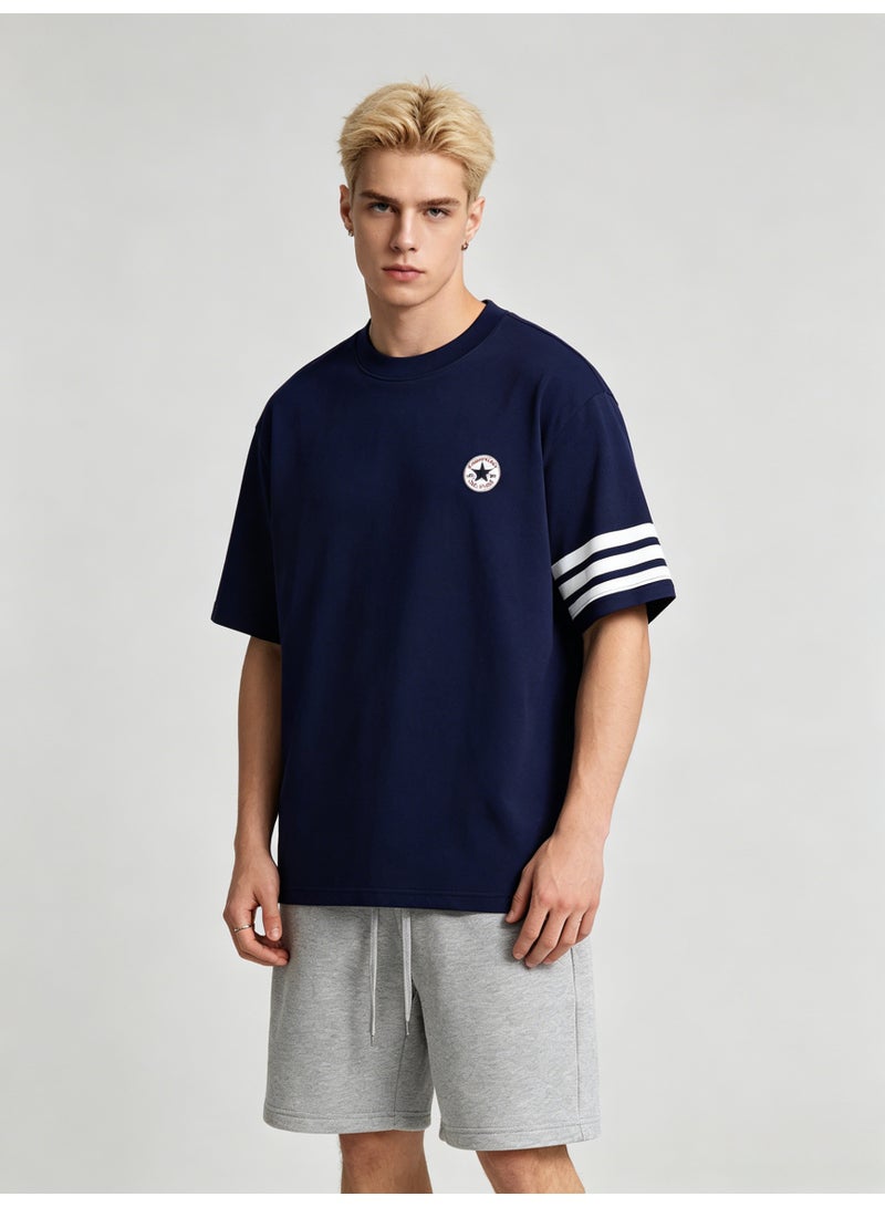 كونفرس Converse Men’s Navy Crew Neck Short Sleeve T-Shirt with Circular Star Logo & Three White Sleeve Stripes - Image 1