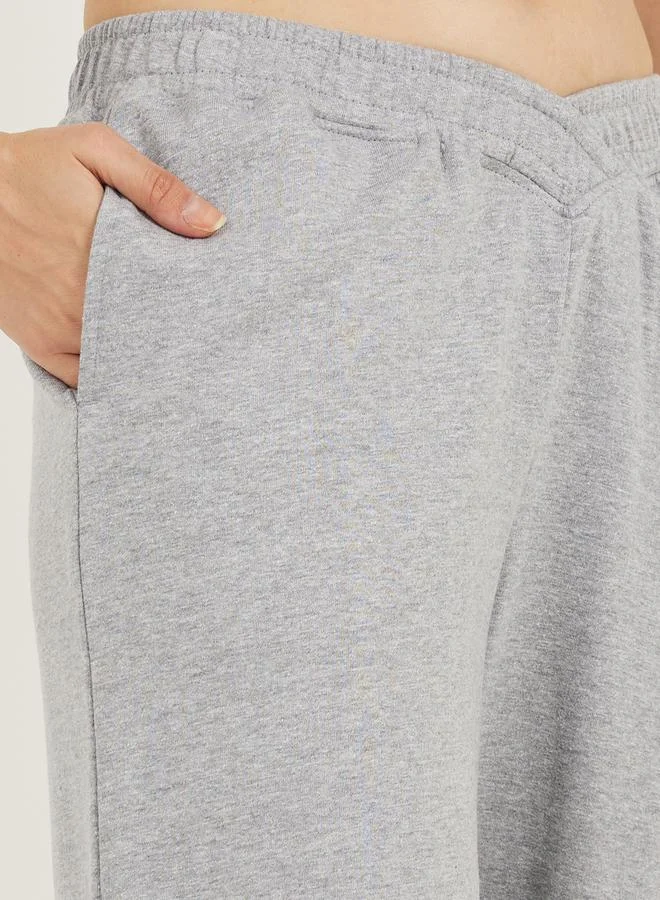 ستايلي High Rise Cross Waistband Tapered Leg Joggers
