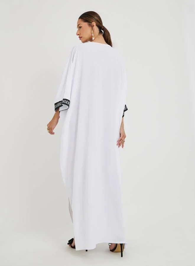 Amirah Amirah Loose Fit Batwing Sleeve Embroidered Jalabiya with Tassel Detail