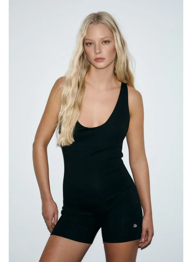 Urban Beat LUNARA Women's Soft and Stretchy Fabric Fitted Short Black Jumpsuit.