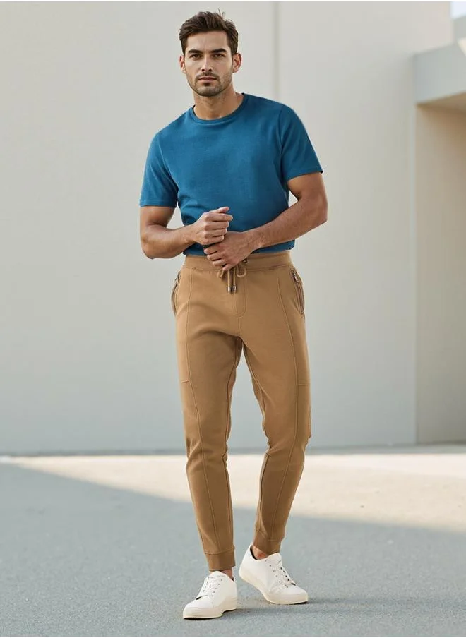 ايكونيك Iconic Slim Fit Joggers with Drawstring Closure and Pockets
