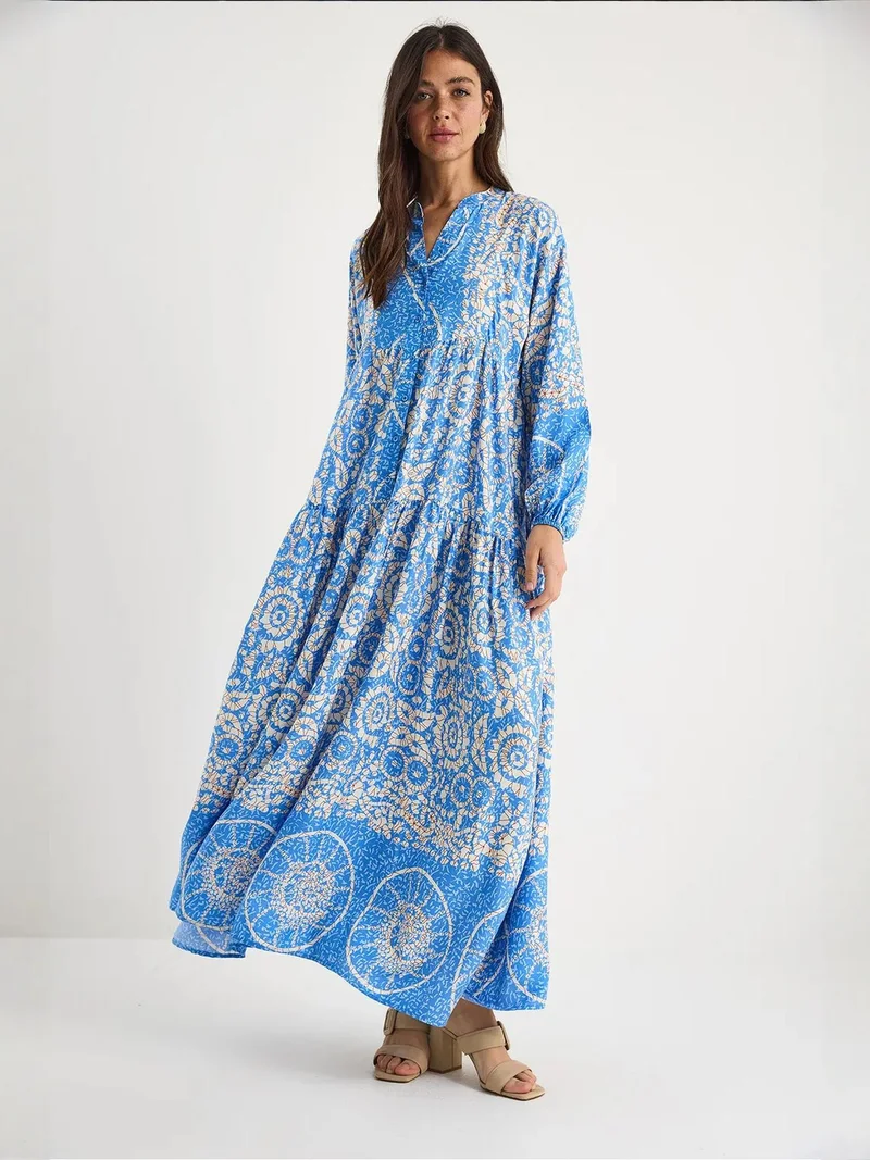 Bianco Lucci Patterned Maxi Dress with V-neck and Button Closure