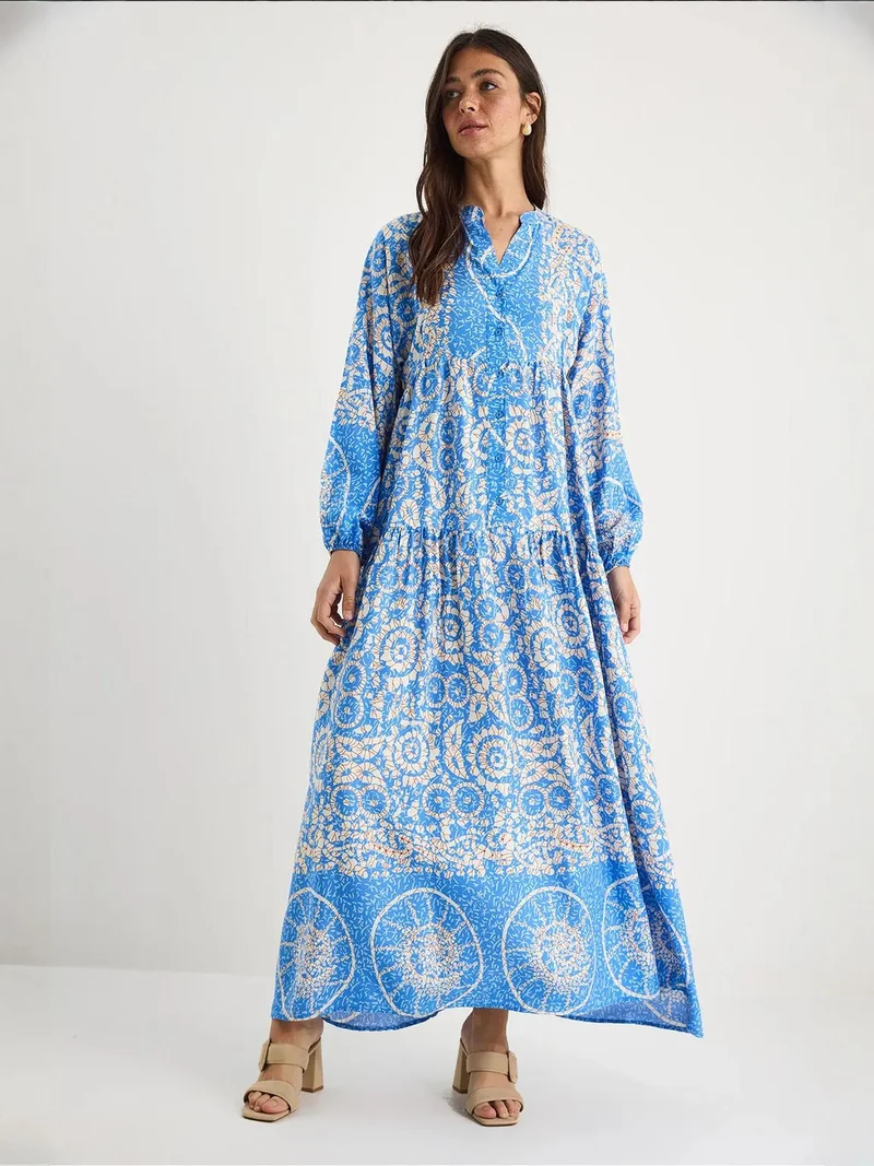 Bianco Lucci Patterned Maxi Dress with V-neck and Button Closure