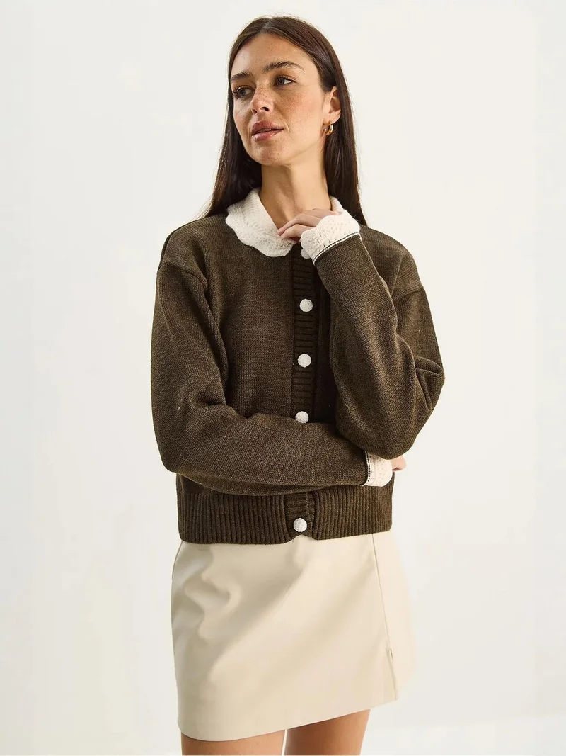 بيانكو لوتشي كارديجان محبوك مضلع سميك بأزرار من لوتشي