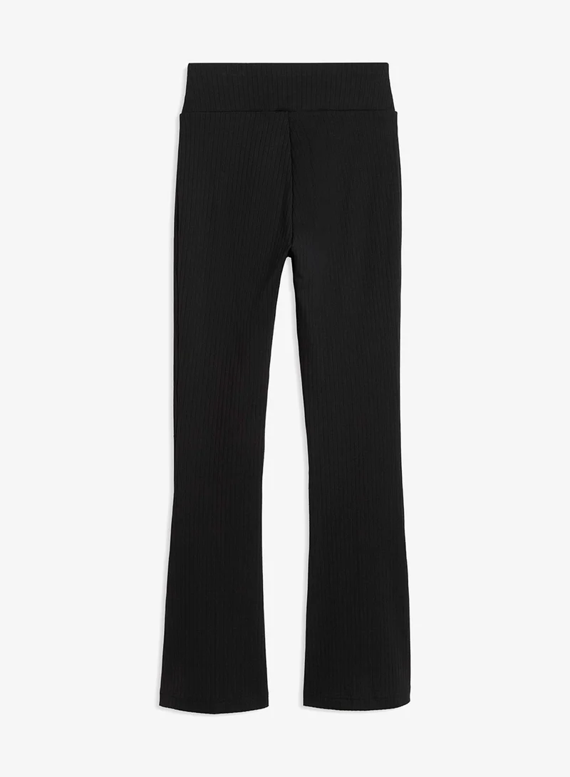 PUMA Her Ribbed Flared Leggings