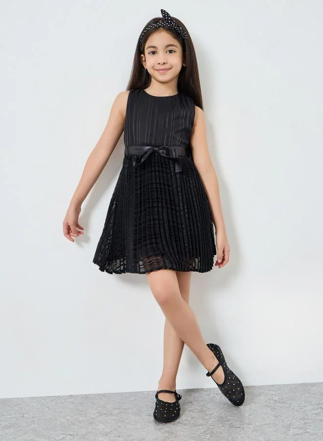 Styli Girls Pleated A-Line Dress with Bow Detail