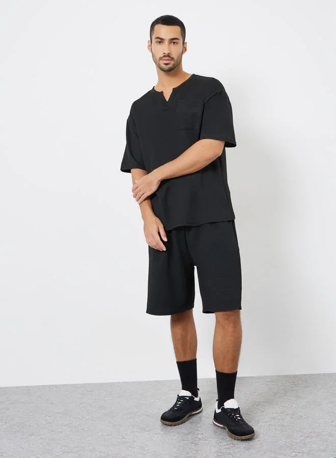 ستايلي طقم منسق من تيشيرت بقصة واسعة وشورت