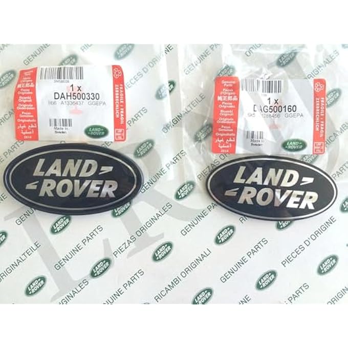 لاند روفر عن شارات بيضاوية اللون الأسود على الفضة - قطع غيار أصلية جديدة DAG500160 + DAH500330 - Image 1