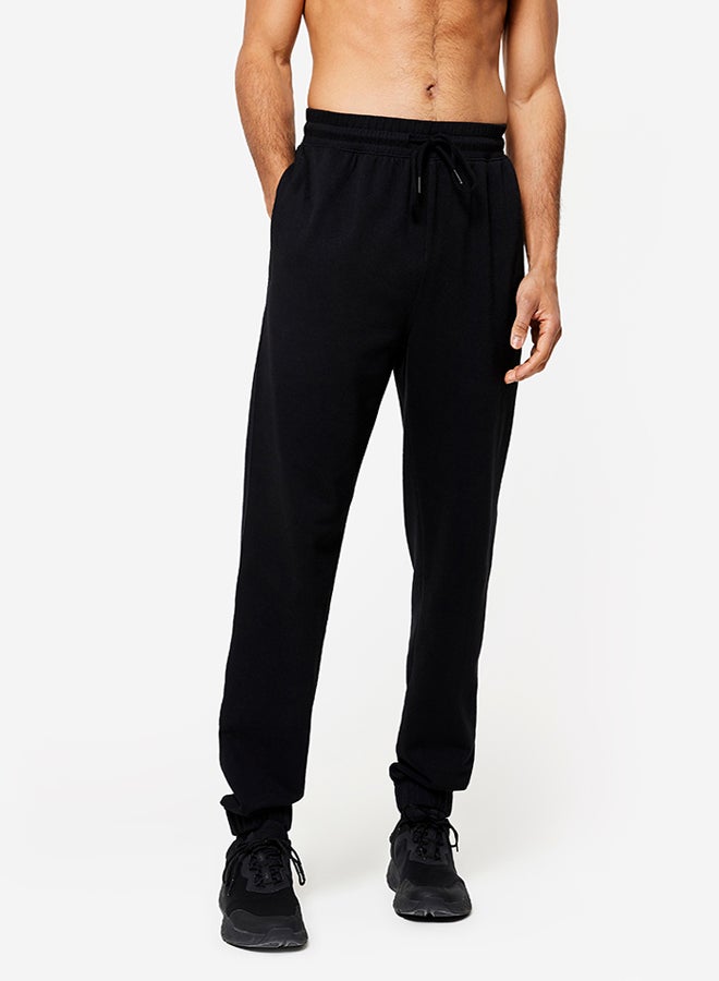DECATHLON Men's Regular Fitness Jogging Bottoms - Image 1