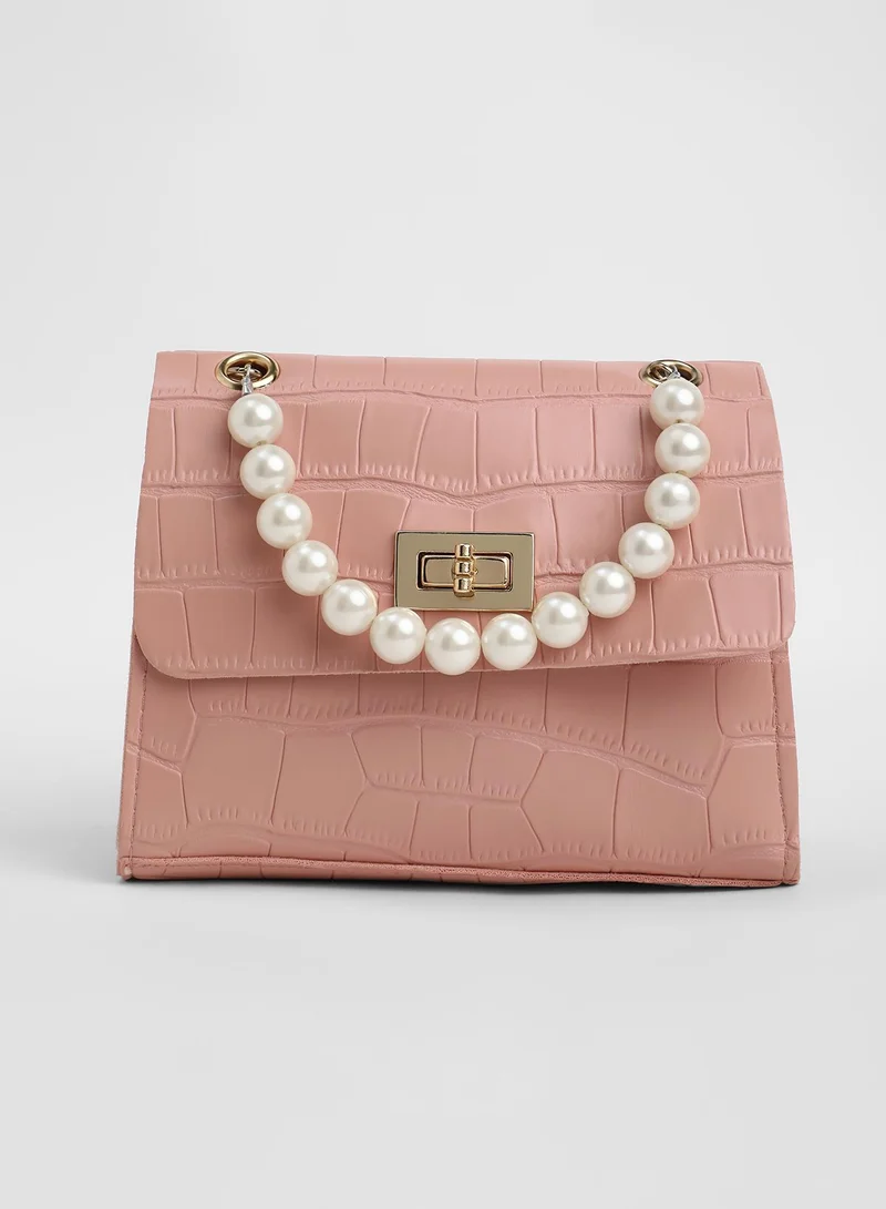 Haute Sauce Solid Twist Lock Regular Vegan Leather Hand Bag For Women