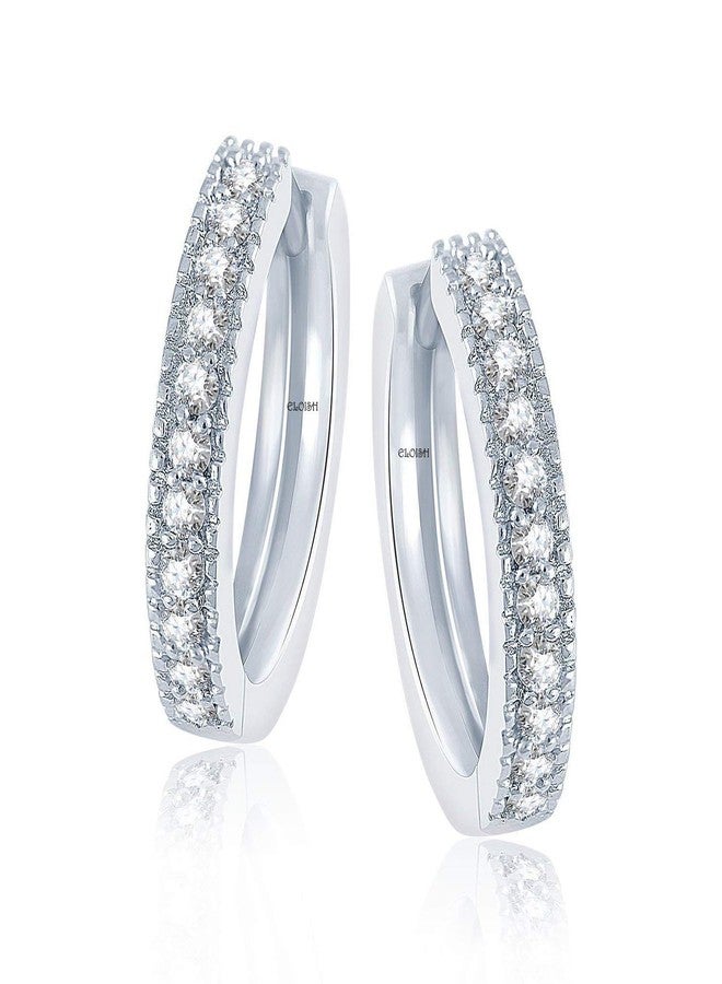 ELOISH Sterling Silver CZ Studded Huggie Earrings for Women. - Image 1