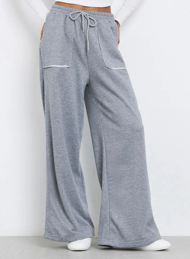 ستايلي جوغر بأرجل واسعة سادة برباط خصر