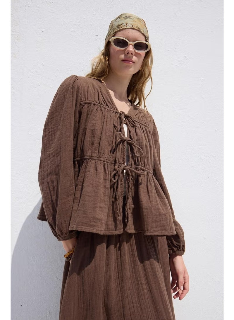 Manuka Muslin Blouse with Tie Detail Brown - Image 1