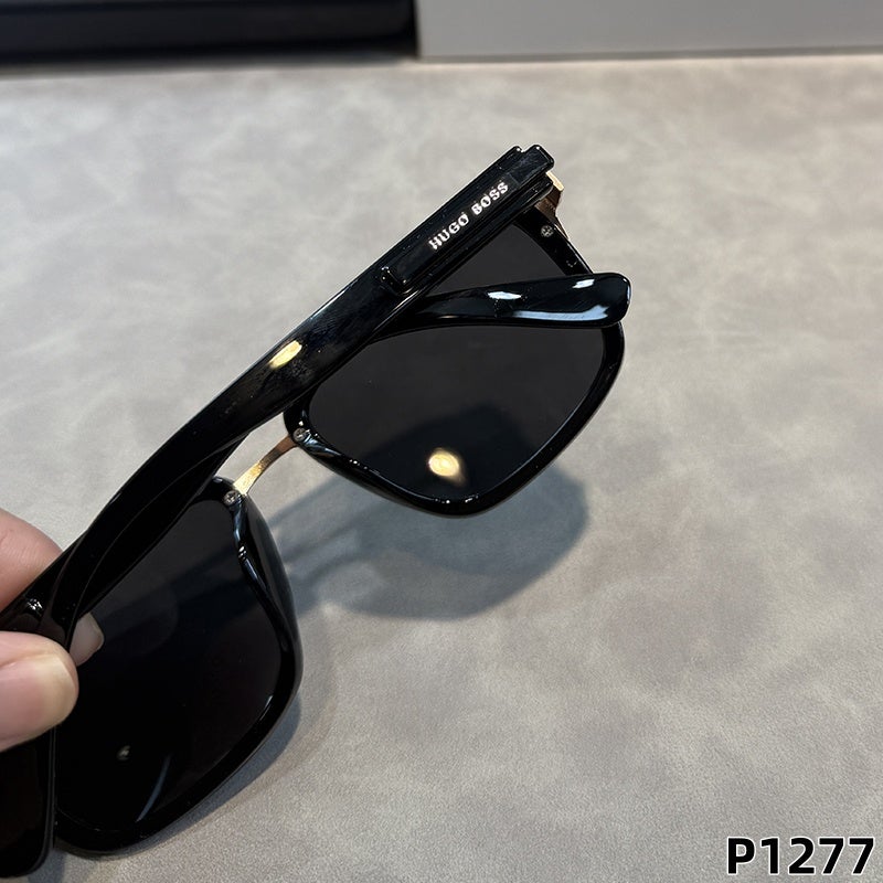 شعار HUGO BOSS البارز على ذراع النظارة باللون الذهبي والأسود