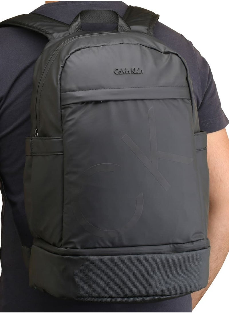 Men's Black Backpack – CK, Sleek & Stylish, Adjustable Padded Straps, Secure Zip Closure, Durable Material, Front & Interior Pockets for Organization, Classic Branding, Ideal for Work, Travel, or Everyday Use, Modern and Practical Accessory