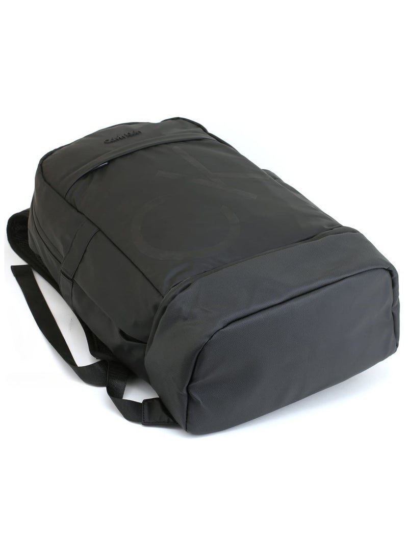 Men's Black Backpack – CK, Sleek & Stylish, Adjustable Padded Straps, Secure Zip Closure, Durable Material, Front & Interior Pockets for Organization, Classic Branding, Ideal for Work, Travel, or Everyday Use, Modern and Practical Accessory