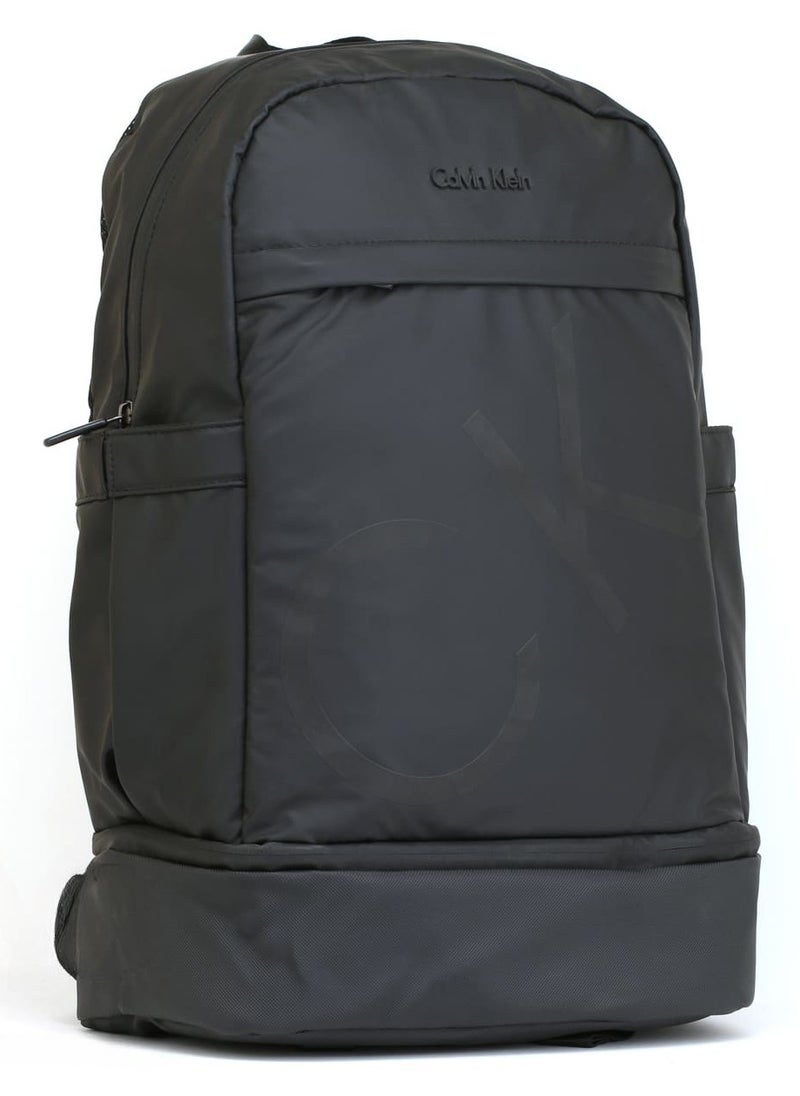 Men's Black Backpack – CK, Sleek & Stylish, Adjustable Padded Straps, Secure Zip Closure, Durable Material, Front & Interior Pockets for Organization, Classic Branding, Ideal for Work, Travel, or Everyday Use, Modern and Practical Accessory