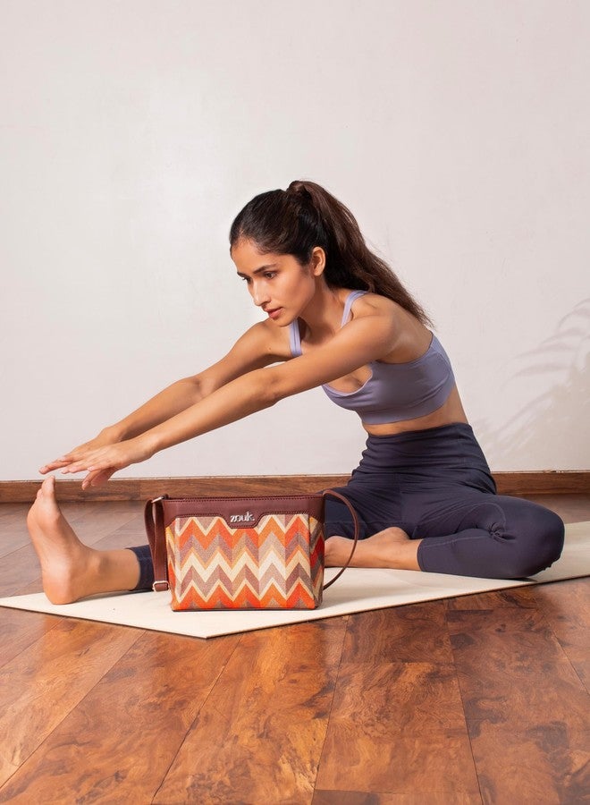 ZOUK حقيبة كتف زوك برتقالية اللون مصنوعة من الجلد النباتي بنقشة موجة المد والجزر، مزودة بحزام قابل للتعديل، مناسبة للنساء والفتيات. - Image 2