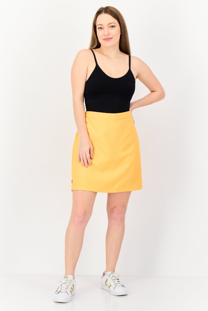 Greg Norman تنورة تدريب مثالية للنساء، برتقالية - Image 2