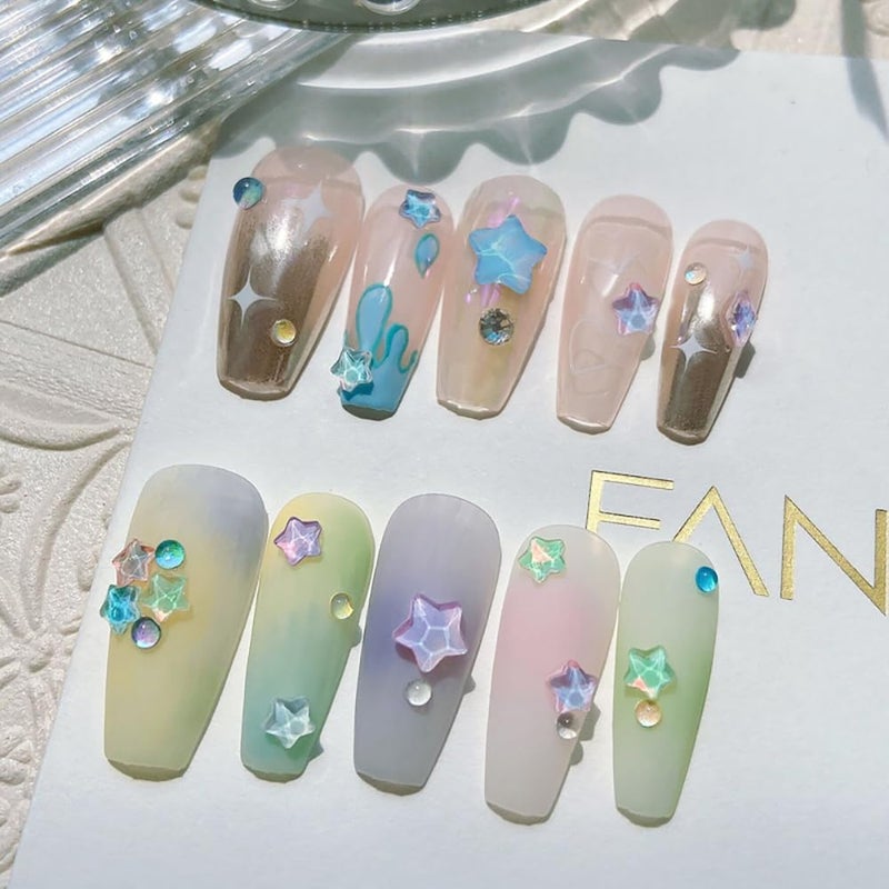JALIYA 50 قطعة من مجوهرات الأظافر بنقش نجمة الكاواي (Mocha Star Kawaii Nail Charms)، بحجم 6 مم، مناسبة لفنون الأظافر وزينة الأظافر. تتميز باللمعان الجميل والألوان الساحرة (ألوان الكاواي). تحتوي على أحجار كريستالية وألماسات بلورية، وسهلة التطبيق على الأظافر. تأتي في كيسات بسعة 50 قطعة لكل كيس. - Image 5