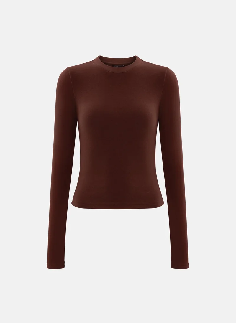 ليتشي بلوزة ذات اكمام طويلة ولون احادي