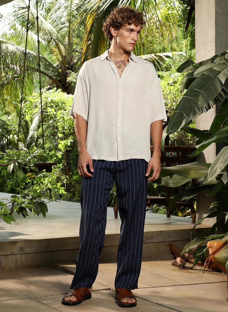 Campus Sutra Campus Sutra Men's Off-White Crinkled Oversized Shirt For Casual Wear | Spread Collar | Short Regular Sleeves | Button Closure | Oversized Shirt Crafted With Comfort Fit For Everyday Wear