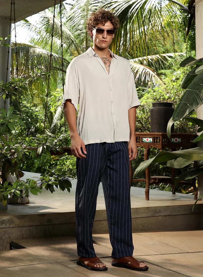 Campus Sutra Campus Sutra Men's Off-White Crinkled Oversized Shirt For Casual Wear | Spread Collar | Short Regular Sleeves | Button Closure | Oversized Shirt Crafted With Comfort Fit For Everyday Wear