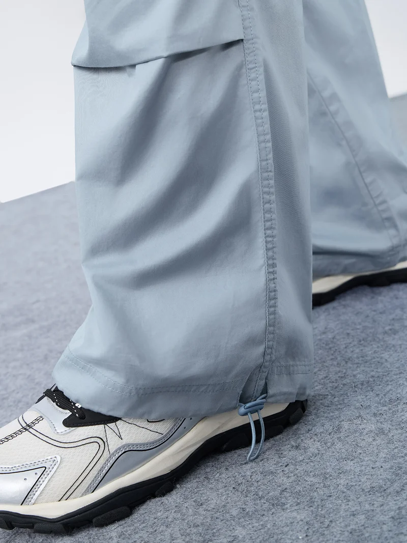 The Souled Store  Essential Drop: Parachute Men and Boys Drawstring Waist Solid Cotton Loose Fit Lightweight Adjustable Hem Utility Cargo Pants  | Best Price UAE