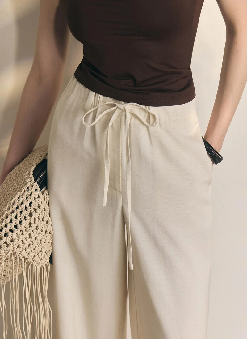 Lichi  Loose-fitting viscose and linen trousers with waist ties for Women | Best Price UAE