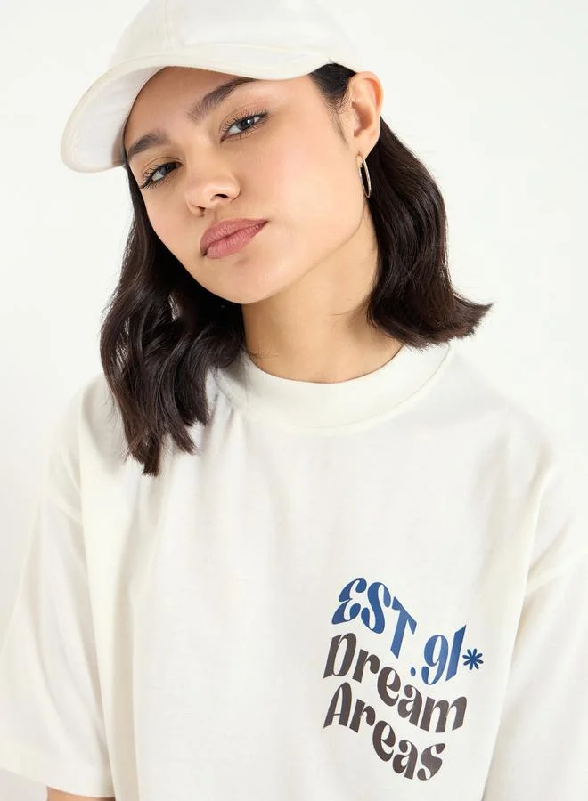 Styli Beige Slogan Print Oversized T-Shirt