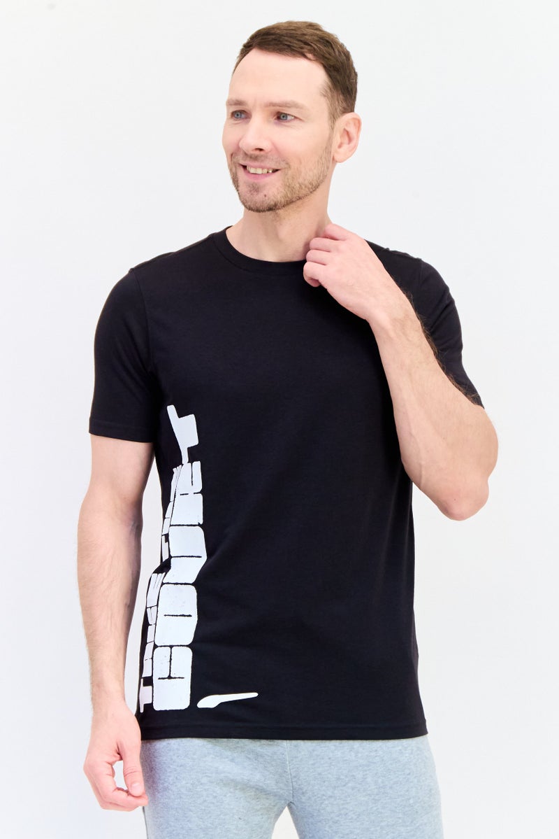 PUMA Men Sportswear Fit Short Sleeve Outdoor T-Shirt, Black - Image 1