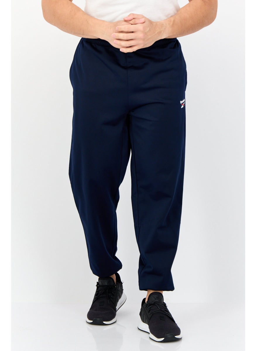 Reebok Men Sportswear Fit Outdoor Sweatpants, Navy  - Image 1