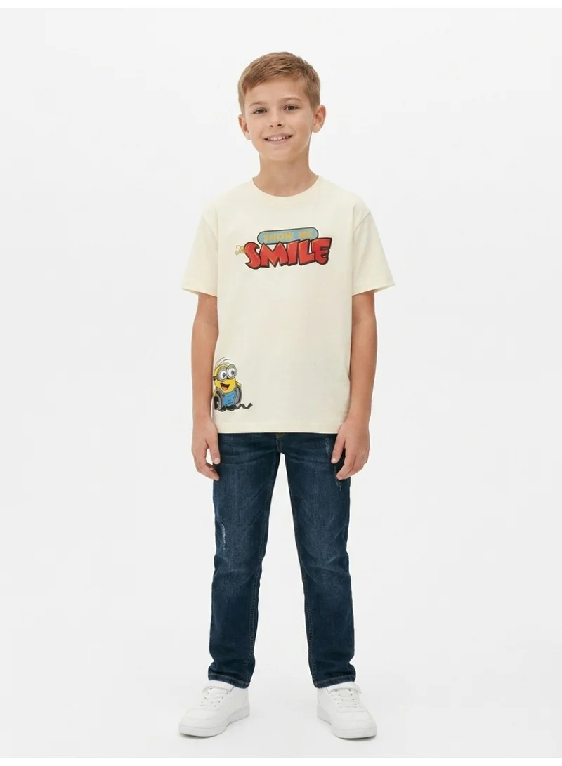 Minions Minions Teen Boys Cream T-Shirt with "SMILE" Graphic Print