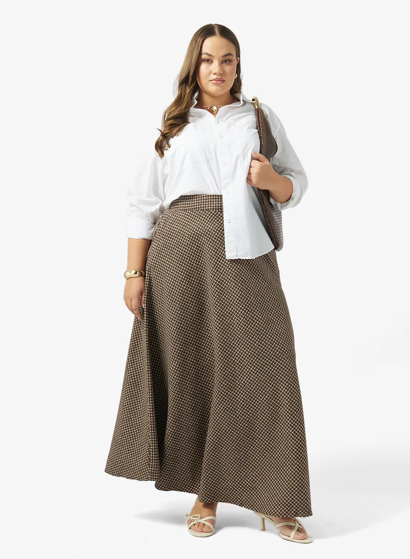 ايلا بلس تنورة - بطبعات مربعات للمقاسات الكبيرة